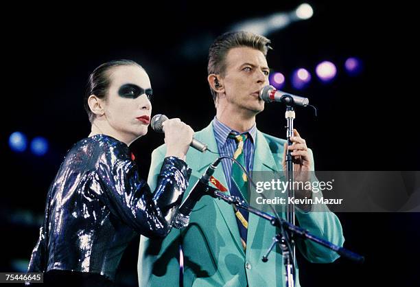 Annie Lennox and David Bowie perform "Under Pressure" at The Freddie Mercury Tribute Concert for AIDS Awareness at Wembley Stadium in London, England...