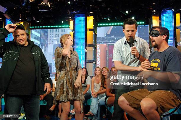 Actor Kevin James, actress Jessica Biel, MTV VJ Damien Fahey and actor Adam Sandler converse as Adam is blindfolded for a game where he has to try to...