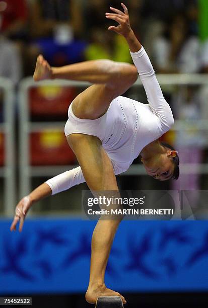 Rio de Janeiro, BRAZIL: Mexican gymnast Elsa Garcia executes her routine on the balance beam during the Rio 2007 Pan American Games at the Arena...