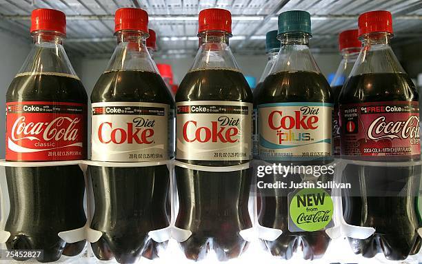 Bottles of Coca Cola are seen on a shelf at the Mayflower Market July 17, 2007 in San Francisco, California. Coca Cola Company reported an increase...