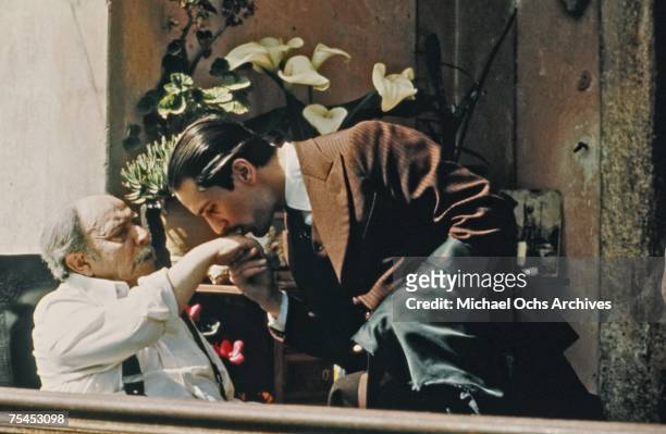 Giuseppe Sillato and Robert De Niro perform a scene in The Godfather Part II directed by Francis Ford Coppola in 1974 in Sicily, Italy.