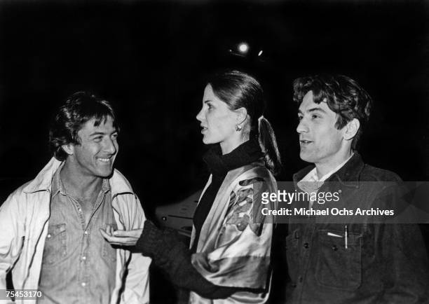 1970s: Dustin Hoffman, Anne Byrne Hoffman, and Robert De Niro enjoy a night on the town circa the late-1970s in New York, New York.