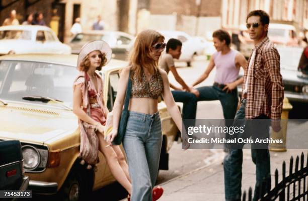 Jodie Foster, Billie Perkins, and Robert De Niro perform a scene in Taxi Driver directed by Martin Scorsese in 1976 in New York, New York.