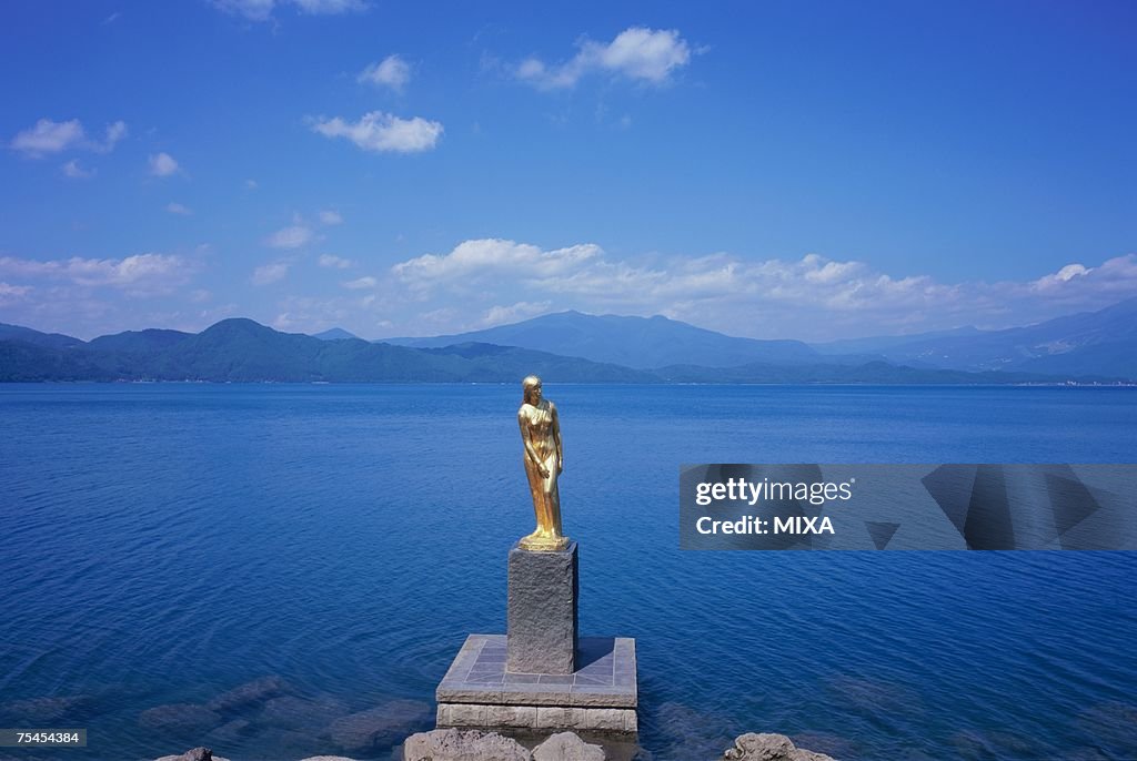 Golden statue at Lake Tazawa in Aomori Prefecture, Japan