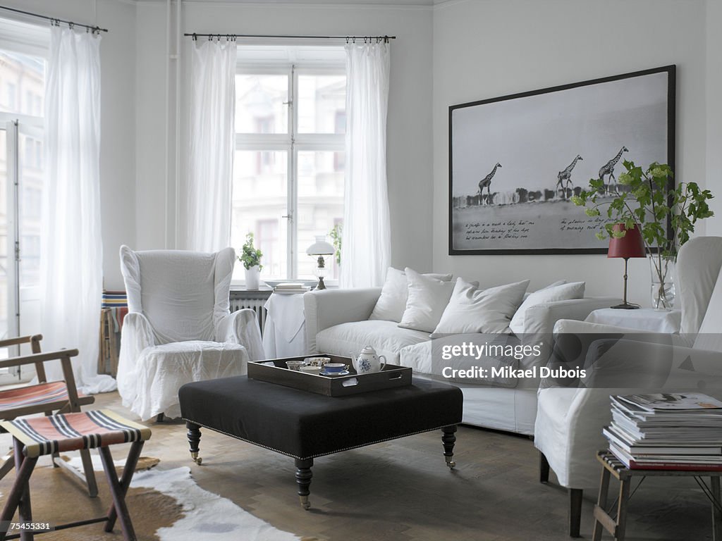 A white couch in a living room.