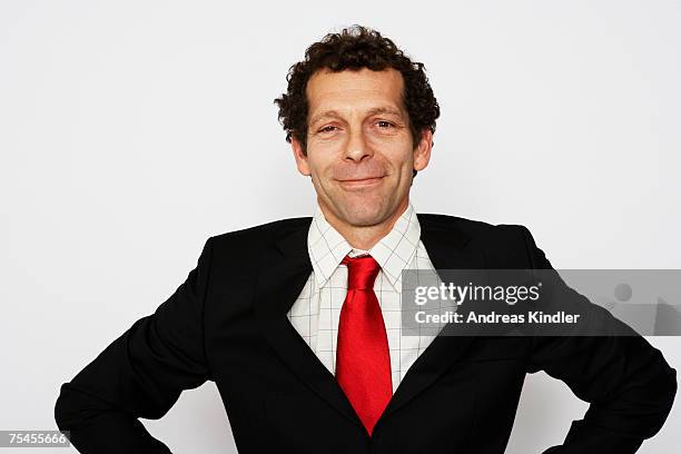 portrait of a satisfied middle-aged man. - red tie stock pictures, royalty-free photos & images