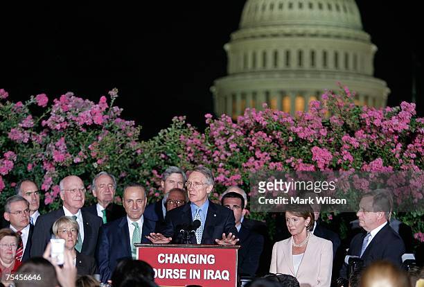Senate Majority Leader Harry Reid flanked by House of Representatives Nancy Pelosi , Sen. Charles Schumer and other members of Congress speaks during...