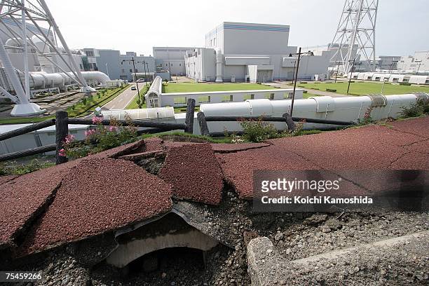 Destroyed road and pavement leading to the number three nuclear power generation unit, where smoke was seen spewing at the Tokyo Electric Power Co...