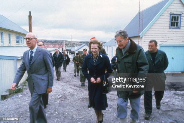 British Prime Minister Margaret Thatcher and her husband Denis visit Stanley Junior School, Stanley in the Falkland Islands, 1983.