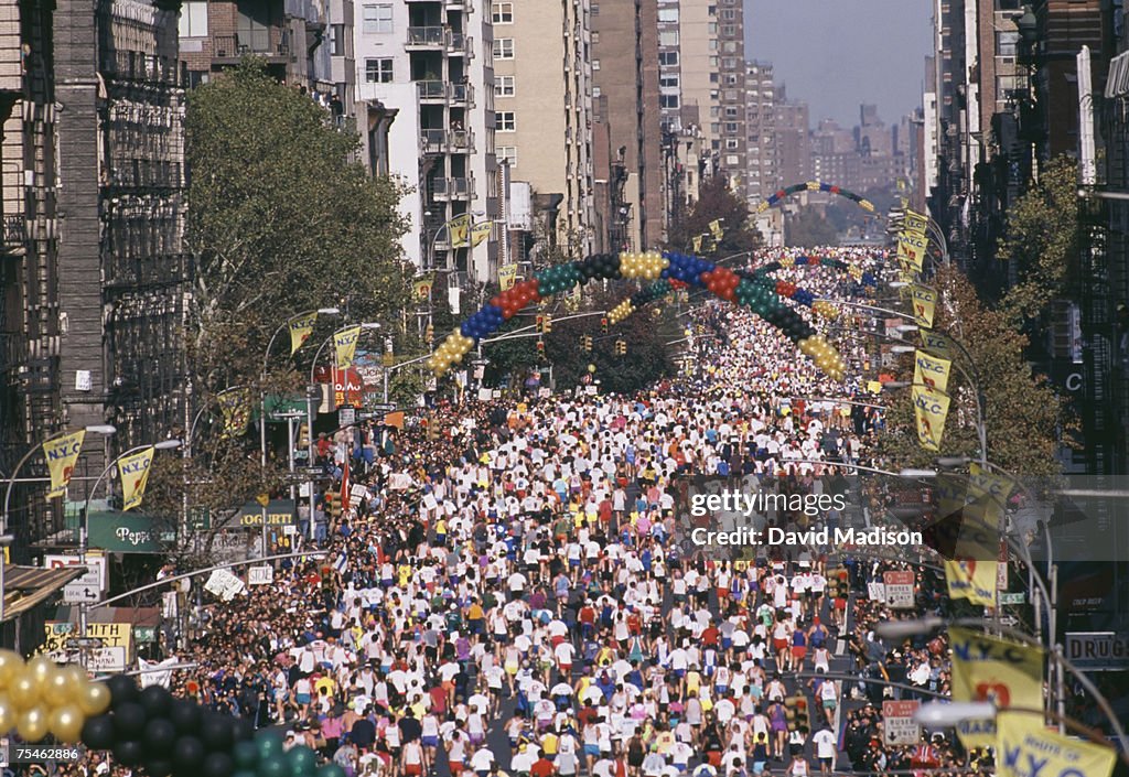High angle view of mass of marathon runners on First Avenue, New York city. New York, USA.