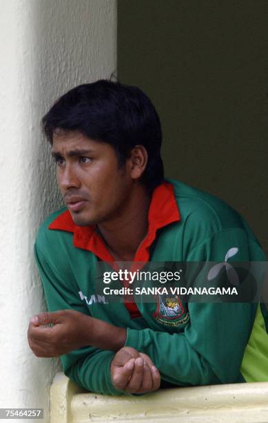 Bangladeshi cricket captain Mohammad Ashraful watches action on the field during a practice match against a Sri Lankan Cricket Invitational XI at The...