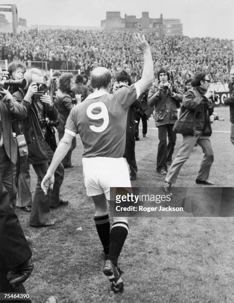 Bobby Charlton waves to the crowd at Stamford Bridge after making his 751st and last appearance for Manchester United before becoming player-manager...