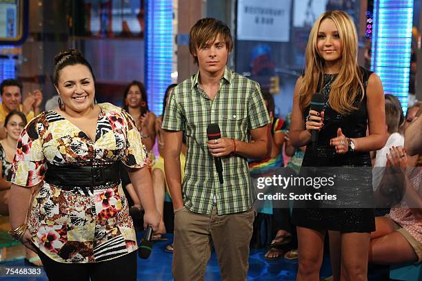 Actress Nikki Blonsky, actor Zac Efron, and actress Amanda Bynes appear onstage during MTV's Total Request Live at the MTV Times Square Studios on...