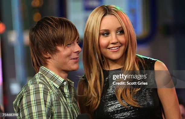 Actress Amanda Bynes and actor Zac Efron appear onstage during MTV's Total Request Live at the MTV Times Square Studios on July 16, 2007 in New York...