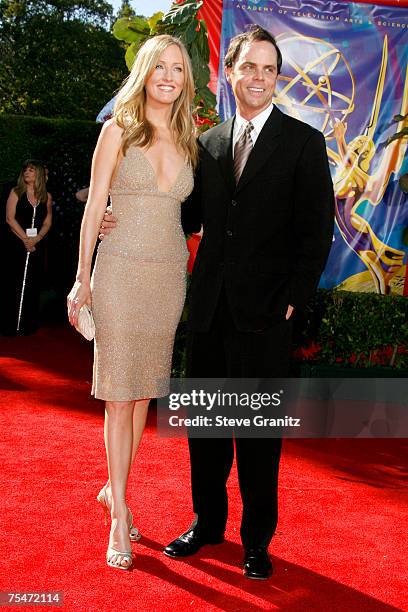 Janel Moloney and Alex Manette at the Shrine Auditorium in Los Angeles, California