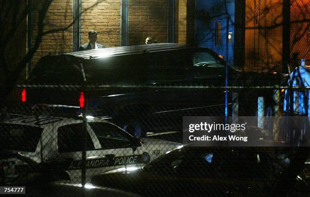 Vehicle containing American Taliban John Walker Lindh enters the Alexandria Detention Center under high security January 23, 2002 in Alexandria,...