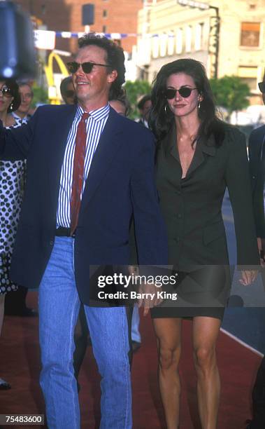 File photo of Michael Keaton and Courteney Cox at the World Premiere of Batman Returns at Manns Chinese Theater in Hollywood, California on June 16,...