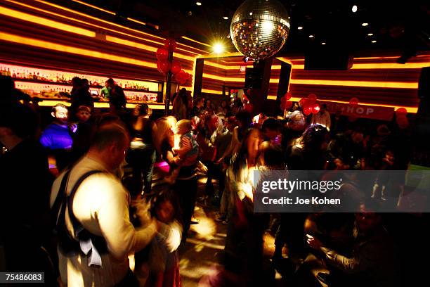 Parents and children hit the dance floor at the Cileo club in New York City during the "Baby Loves Disco" Party on Jan 13 2007. The monthly event is...