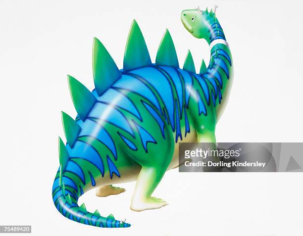 Cartoon Character Depiction Of Green Dinosaur With Blue Stripy Skin And  Spikes Side View High-Res Vector Graphic - Getty Images