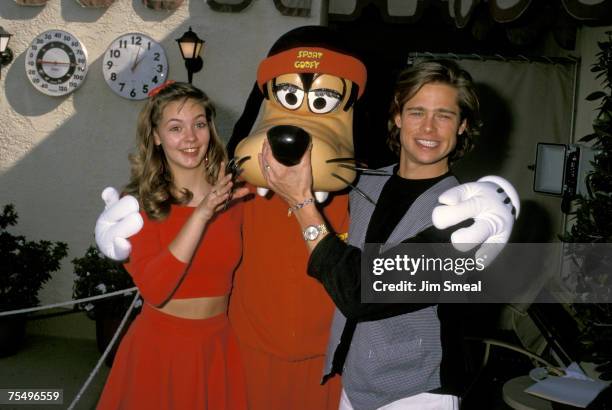 Shalane McCall, Goofy, and Brad Pitt at the L'Ermitage in Beverly Hills, CA