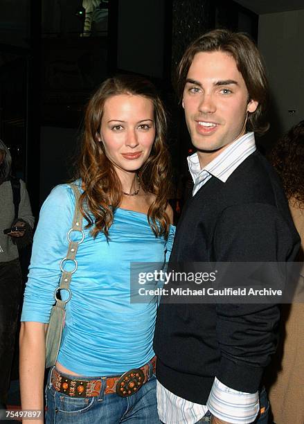 Amy Acker and James Carpinello during The WB Networks 2004 All Star Party - Inside at the Hollywood and Highland in Hollywood, California.