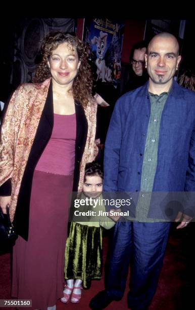 Alex Kingston & Family at the World Premiere of "Lady & The Tramp II: Scamp's Adventure" at the El Capitan Theater in Hollywood, California