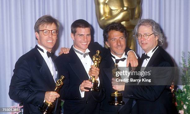 Mark Johnson, Tom Cruise, Dustin Hoffman and Barry Levinson at the Shrine Auditorium in Los Angeles, California