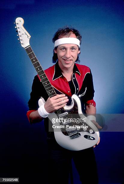 Mark Knopfler of Dire Straits on 8/3/85 in Chicago,Il. In Various Locations,