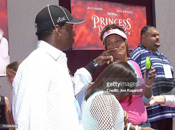 Whitney Houston, Bobby Brown and daughter at the "The Princess Diaries 2: Royal Engagement" World Premiere - Arrivals at AMC Downtown Disney in...