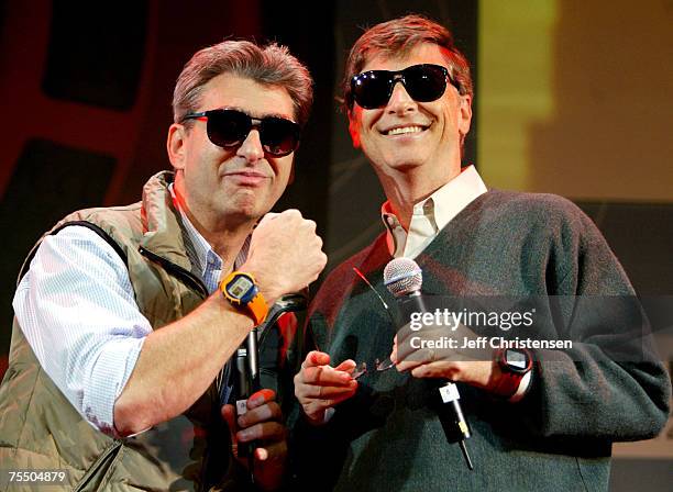 Nick Hayek Jr., CEO of Swatch Group and Bill Gates, chairman Microsoft Chairman/chief Software Architect, show the new watch line called "Paparazzi"...