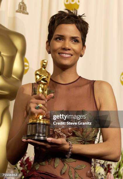 Halle Berry poses with her Actress in a Leading Role Oscar for "Monster's Ball" at the Kodak Theater in Hollywood, California