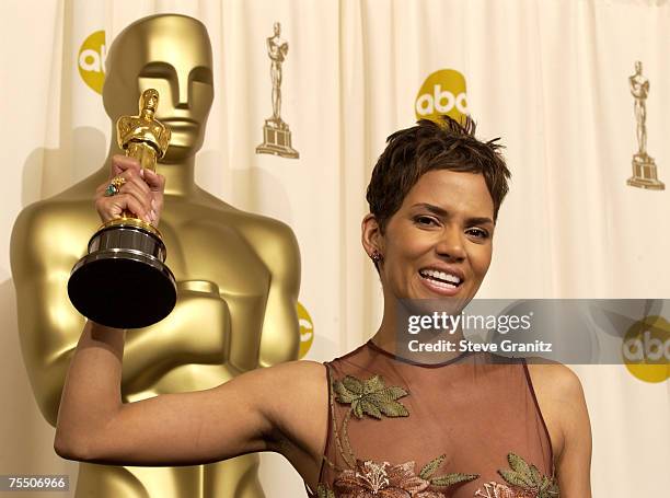 Halle Berry poses with her Actress in a Leading Role Oscar for "Monster's Ball" at the Kodak Theater in Hollywood, California