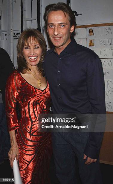 Actress Susan Lucci and designer Luca pose at the Luca Luca Fashion Show February 12, 2002 in New York City.