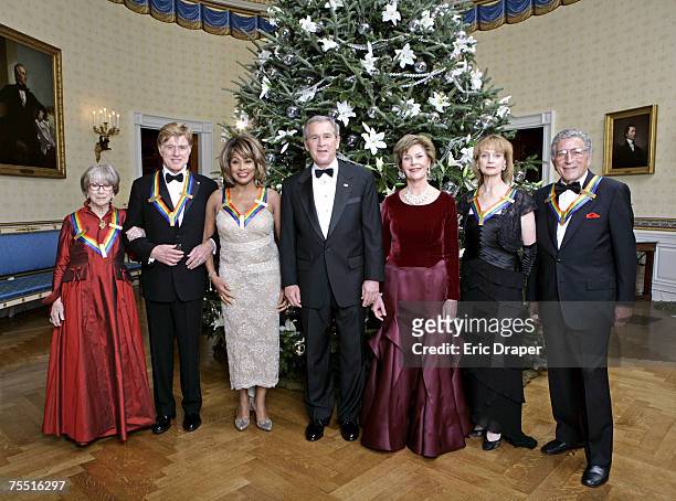 President George W. Bush and Laura Bush pose with the Kennedy Center honorees, from left to right, actress Julie Harris, actor Robert Redford, singer...