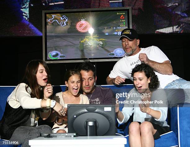 Scout Willis, Tallulah Willis, Johnny Messner, Bruce Willis and Rumer Willis at the Sony Computer Entertainment America and the Bruce Willis...