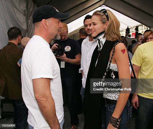 Bruce Willis and Brooke Burns at the Sony Computer Entertainment America and the Bruce Willis Foundation Present Playstation BANDtogether - Inside at...