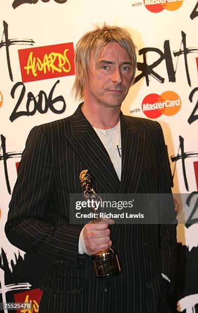 Paul Weller with his Brit Award for Lifetime Acheivement at the Earls Court in London, United Kingdom.