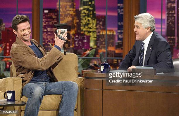 Hugh Jackman pulled out a video camera at THE TONIGHT SHOW WITH JAY LENO and asked the late night host, his band and the studio audience to help wish...