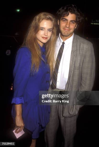 Kelly Preston and George Clooney at the Century Plaza Hotel in Los Angeles, CA.