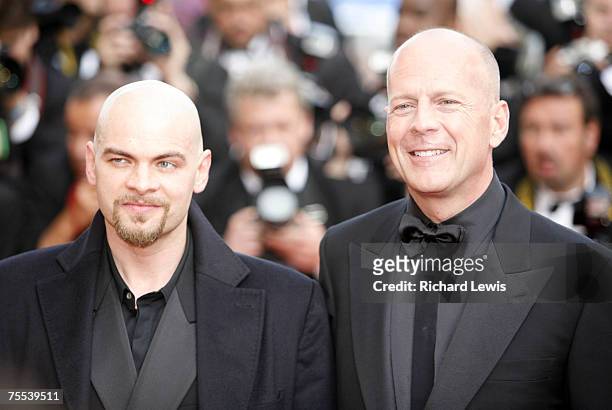 Clovis Cornillac and Bruce Willis at the Palais des Festival in Cannes, France.