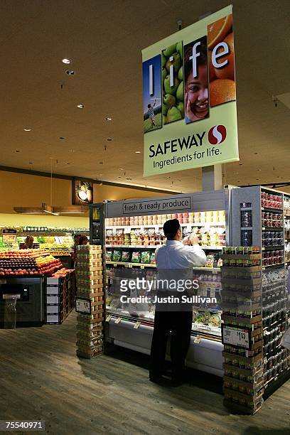 Safeway customer shops for fresh fruit at Safeway's new "Lifestyle" store July 18, 2007 in Livermore, California. Safeway unveiled its newest...