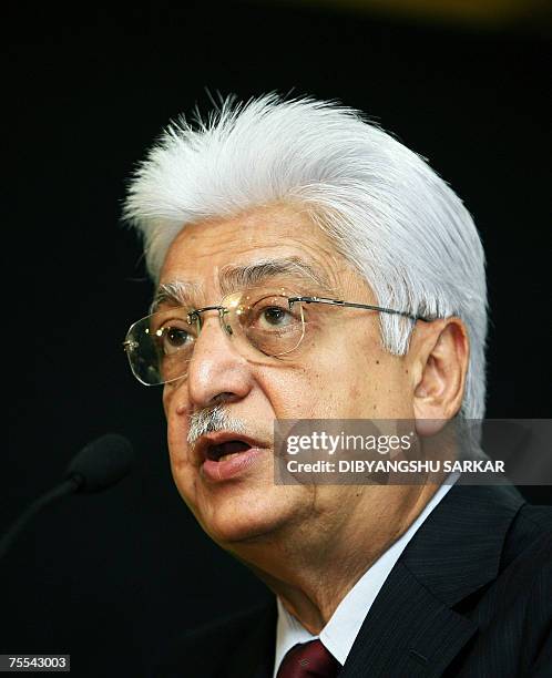Chairman of Wipro Technology Azim Premji gestures as he announces the fiscal first-quarter financial results of the company during a press conference...