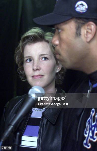 Lisa Beamer , whose husband Todd Beamer was killed on flight 93 over PA, listens to New York Mets'' Roberto Alamar speak after receiving a check from...