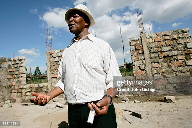 Double Olympic Gold Medallist Kip Keino stands on the construction site of a new secondary school which he is building on February 19, 2007 in...