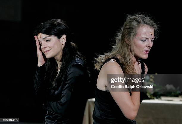 Jasmin Tabatabai , playing the part of Kriemhild and Annika Pages, playing the part of Bruenhild perform on stage during the rehearsal of "Die...
