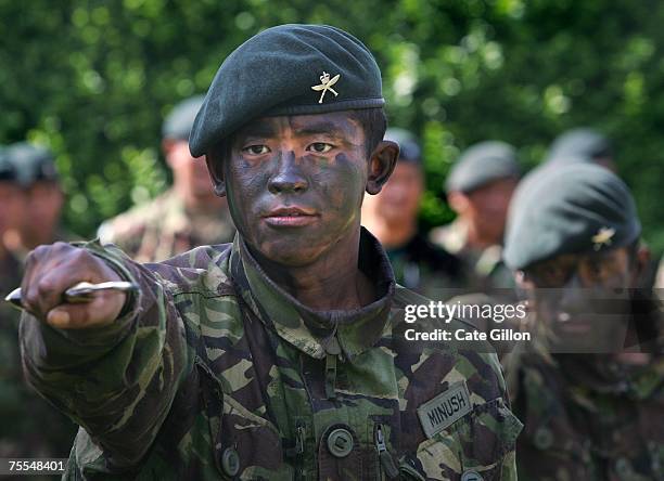 The First Battalion of the Royal Gurkha Rifles demonstrate Khukuri Fighting on July 19 2007 at the Sir John Moore barracks in Folkstone, England. The...