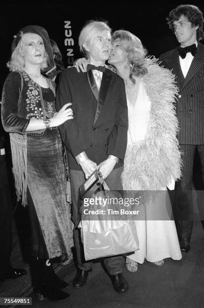 From left, American actress Candy Darling , pop artist Andy Warhol , and actress Sylvia Miles and her companion, model Rudolf Martinus attend the...