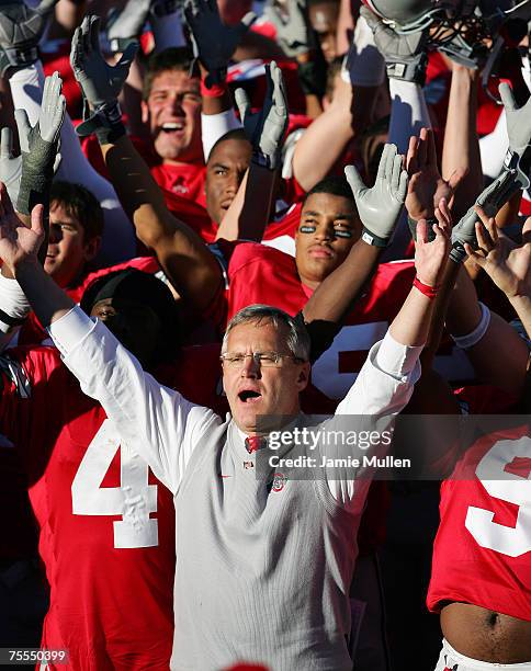 Ohio State Head Coach, Jim Tressel, and Receiver, Santonio Holmes , and other members of the Ohio State Buckeyes sing Carmen Ohio after their game...