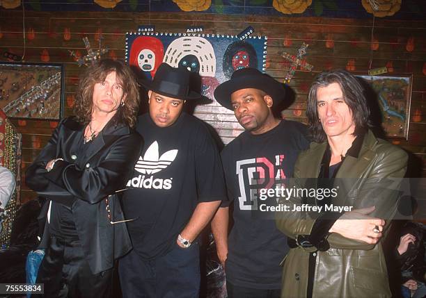 Steven Tyler of Aerosmith, Joseph "DJ Run" Simmons, Jason "Jam Master Jay" Mizell and Joe Perry of Aerosmith backstage at HOB