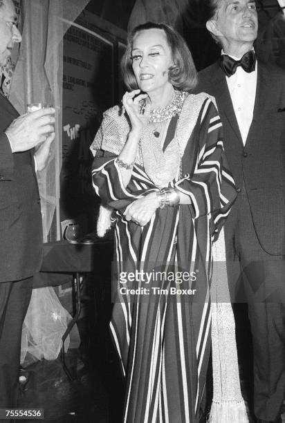 American actress Gloria Swanson and friend author William Dufty attend the opening night production of 'The Me Nobody Knows' at the Helen Hayes...